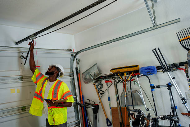 Professional Garage Door Panel Replacement technician working in West Park, NJ